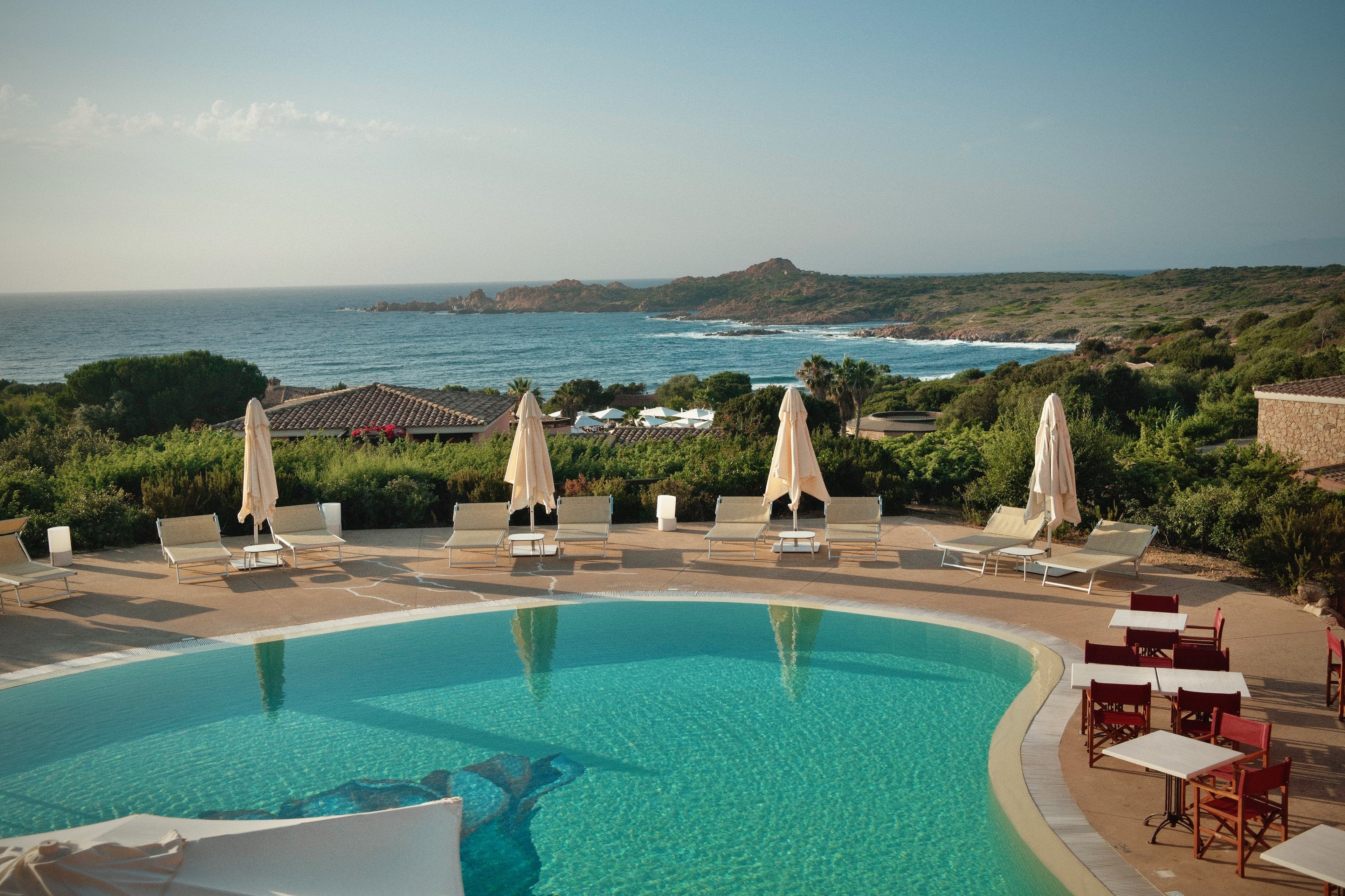 Emma-Kate’s photograph of the Sardinia hotel pool with the coast beyond.